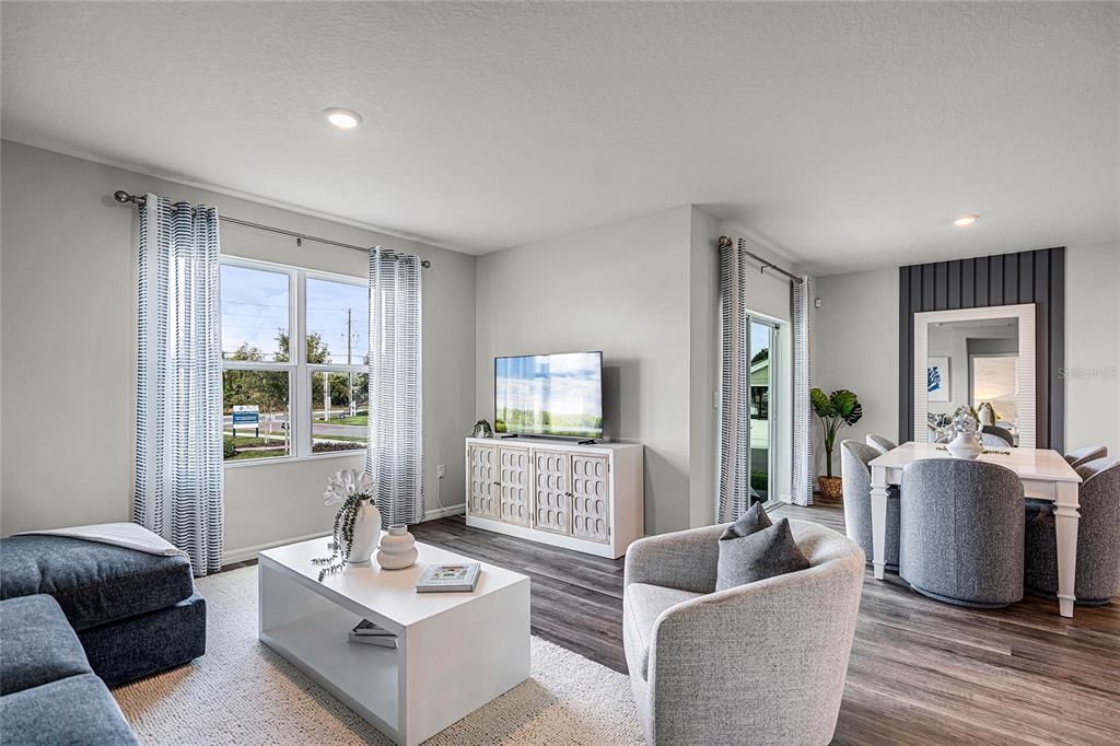 3514 Roden Road Haines City, FL 33844 - Photo 4 of 35 a living room with furniture and a large window