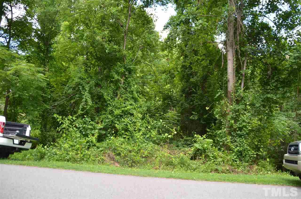 5321 Olive Road Raleigh, NC 27606 - Photo 1 of 4 a view of a garden with a bench
