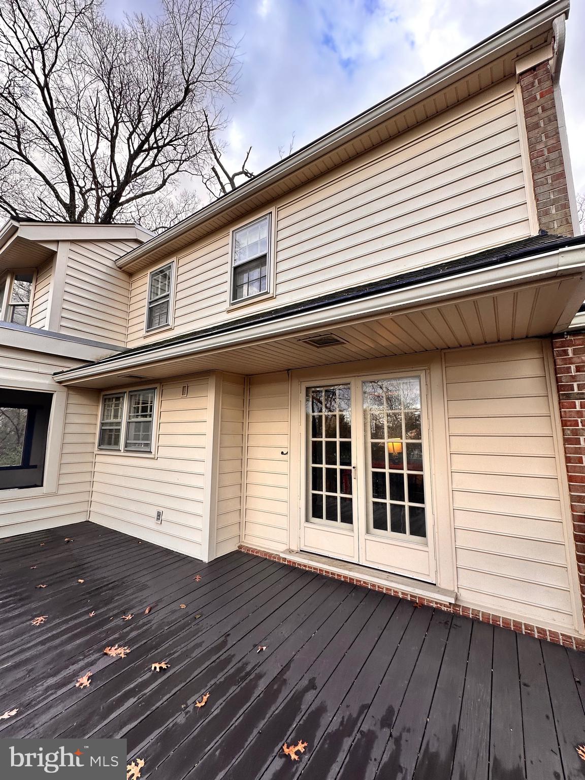 18929 Diary Road Gaithersburg, MD 20886 - Photo 12 of 52 a view of a house with wooden deck