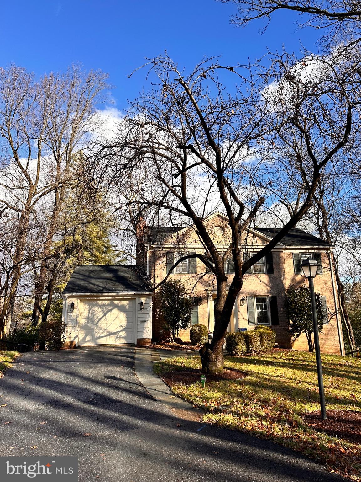 18929 Diary Road Gaithersburg, MD 20886 - Photo 2 of 52 a view of a yard with a tree