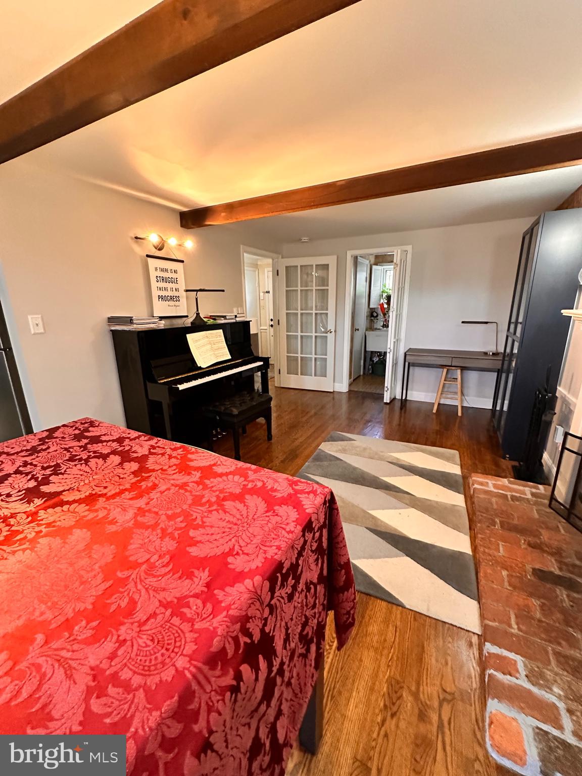 18929 Diary Road Gaithersburg, MD 20886 - Photo 7 of 52 a bedroom with a bed and wooden floor