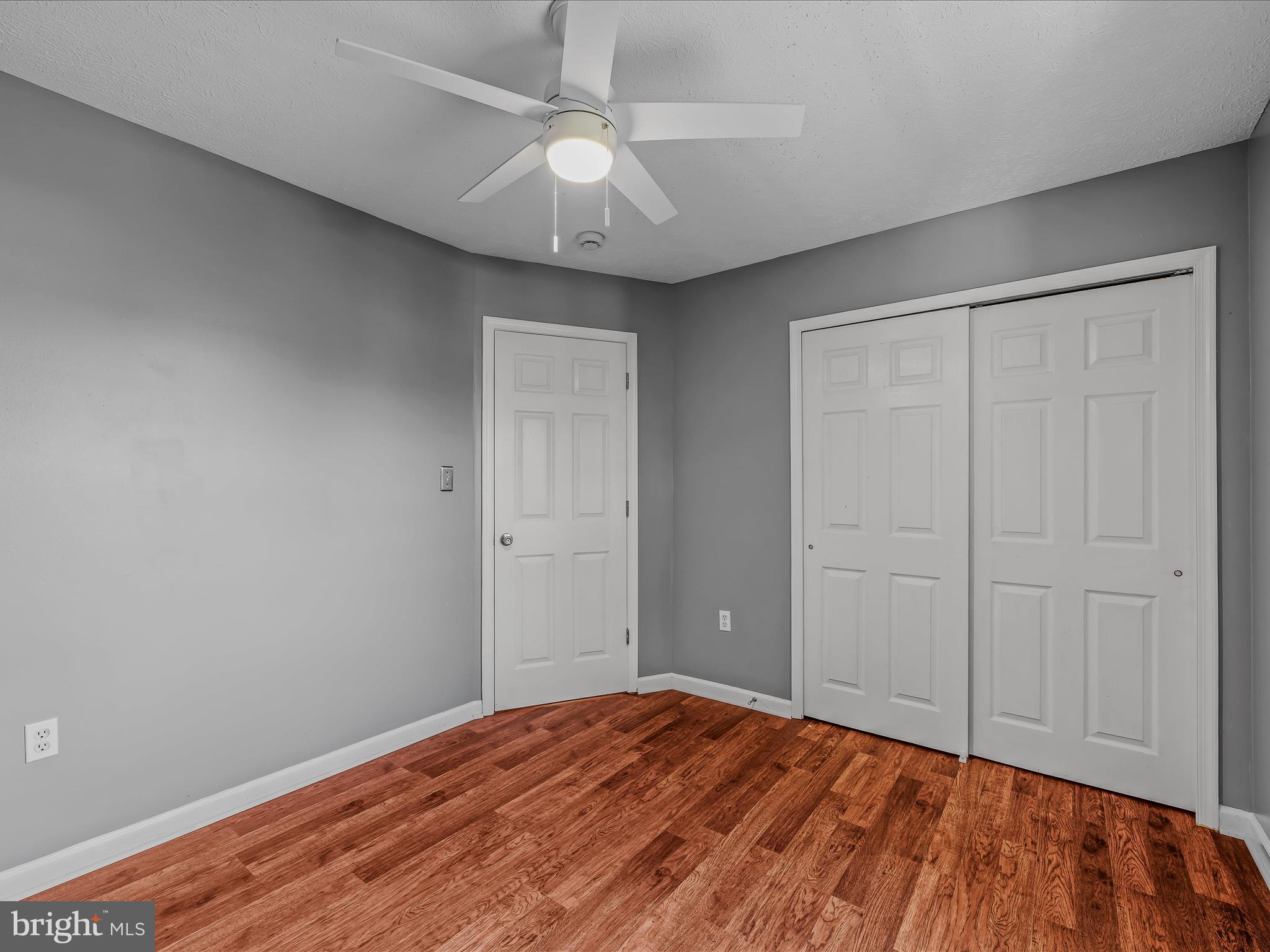 571 Oak Lee Drive Ranson, WV 25438 - Photo 16 of 45 wooden floor in an empty room