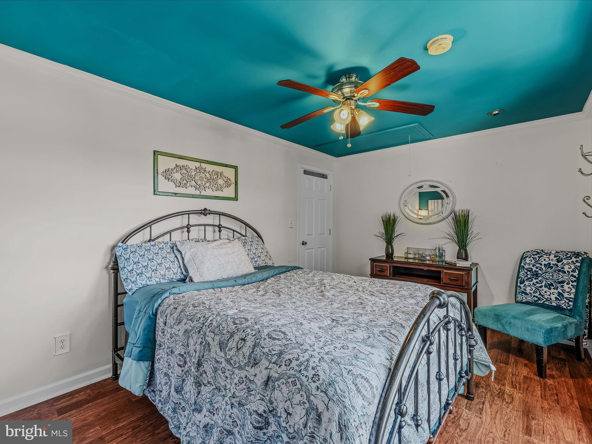 571 Oak Lee Drive Ranson, WV 25438 - Photo 19 of 45 a bedroom with a bed and a table