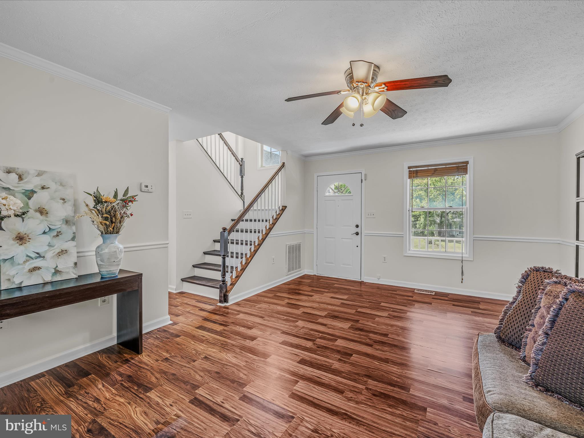 571 Oak Lee Drive Ranson, WV 25438 - Photo 2 of 45 a bedroom with a bed and window