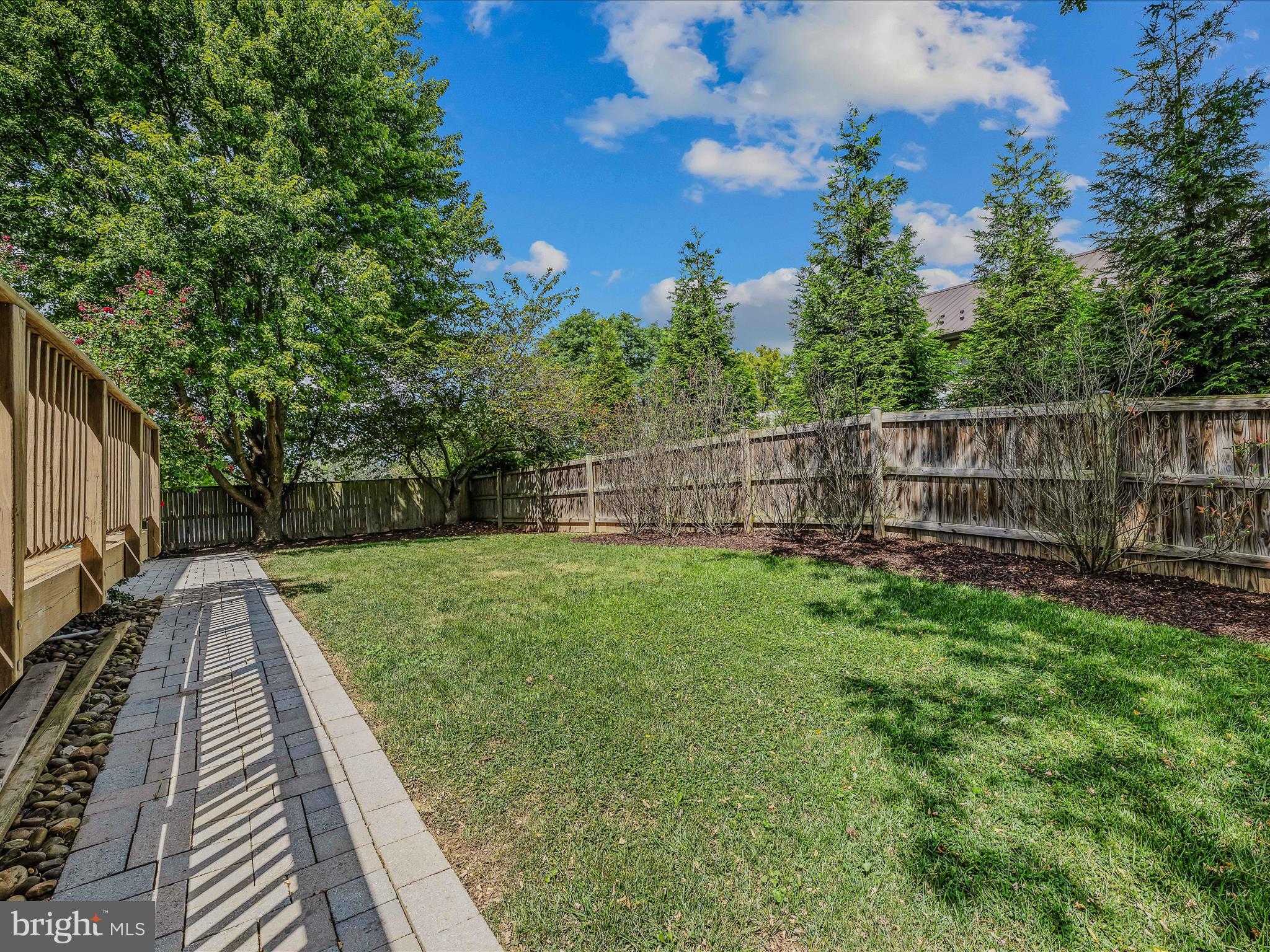 571 Oak Lee Drive Ranson, WV 25438 - Photo 25 of 45 a view of a backyard with wooden fence
