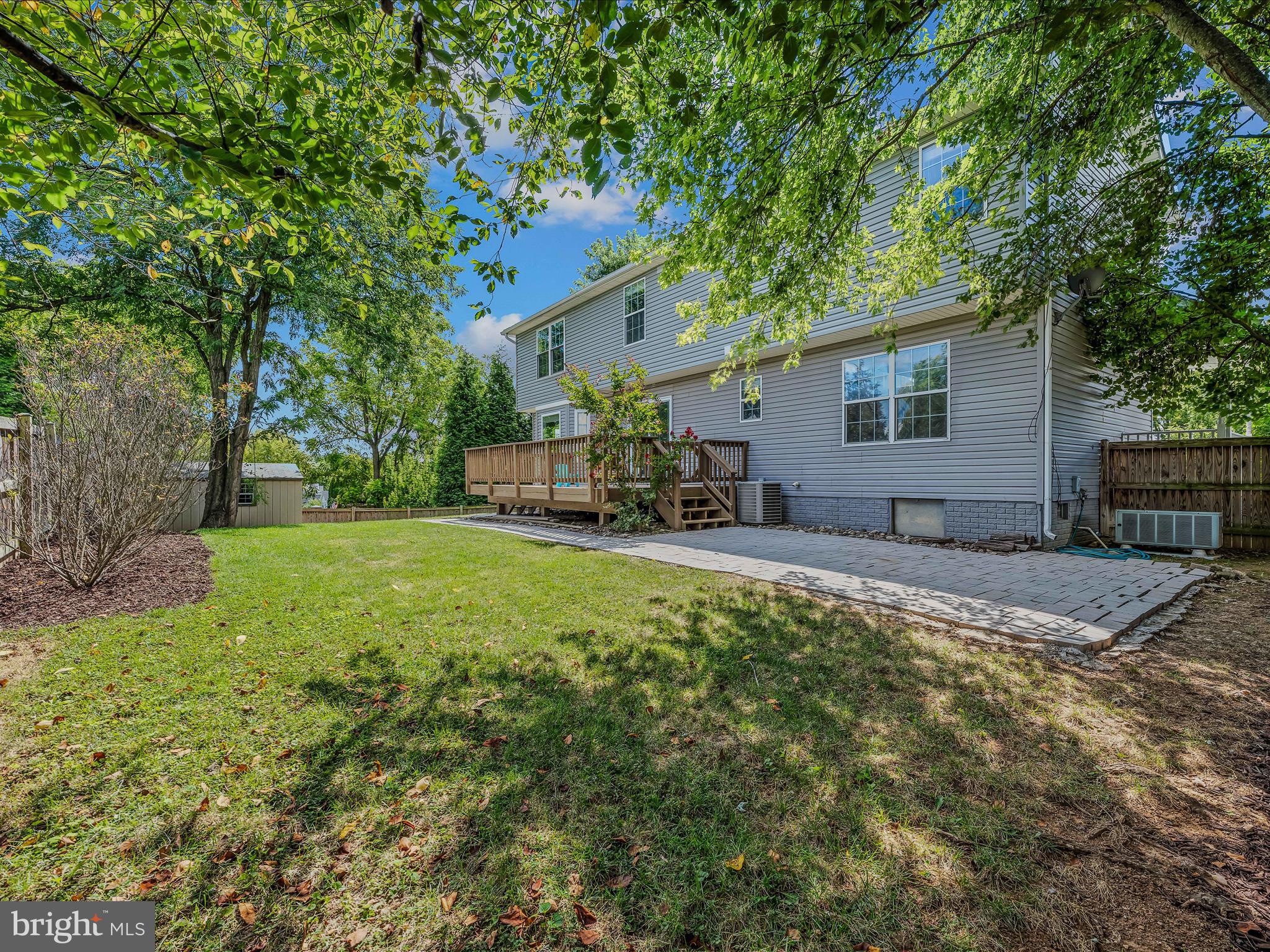 571 Oak Lee Drive Ranson, WV 25438 - Photo 28 of 45 a house view with a sitting space and garden
