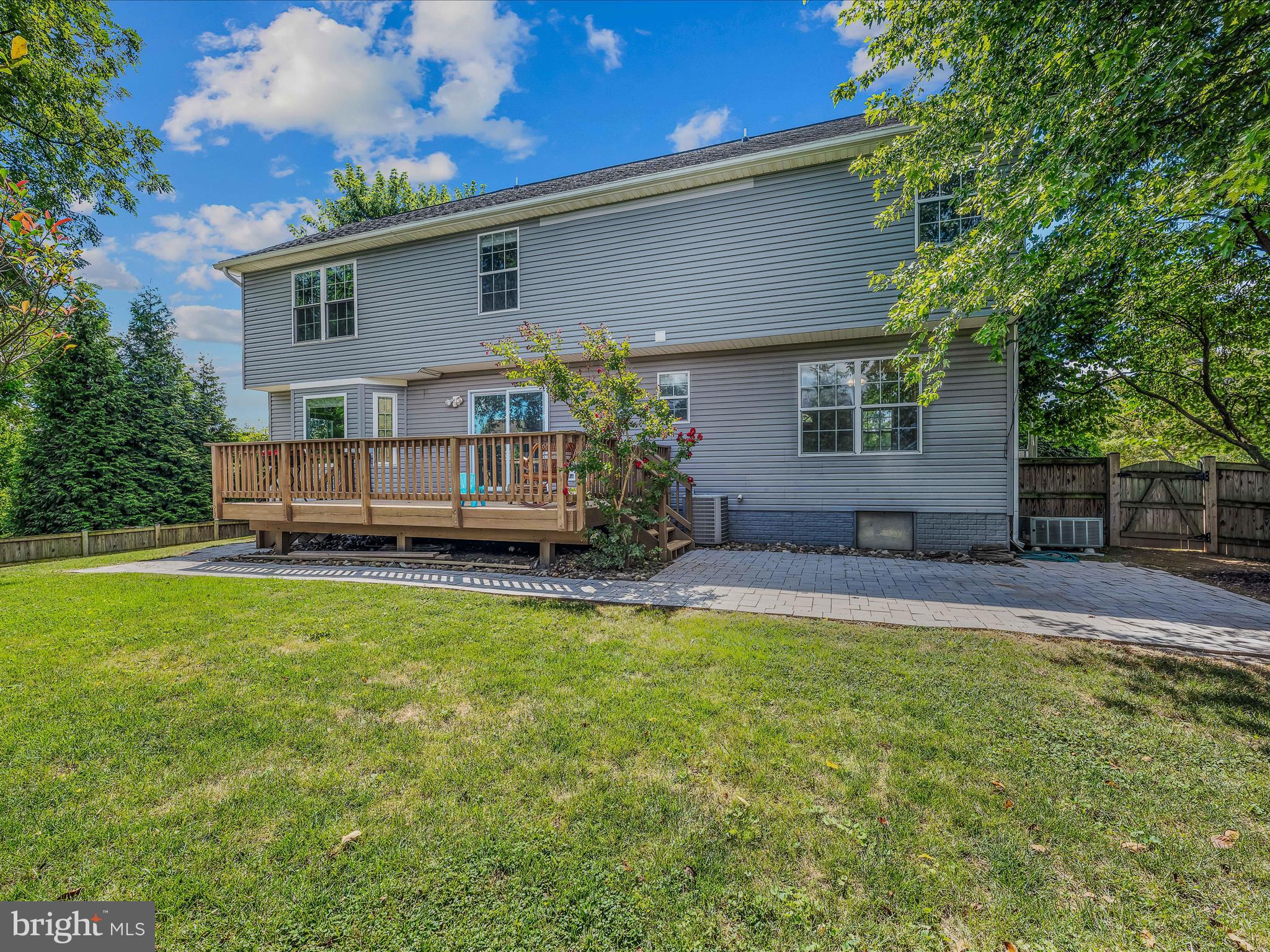571 Oak Lee Drive Ranson, WV 25438 - Photo 29 of 45 a front view of house with yard and trees in the background