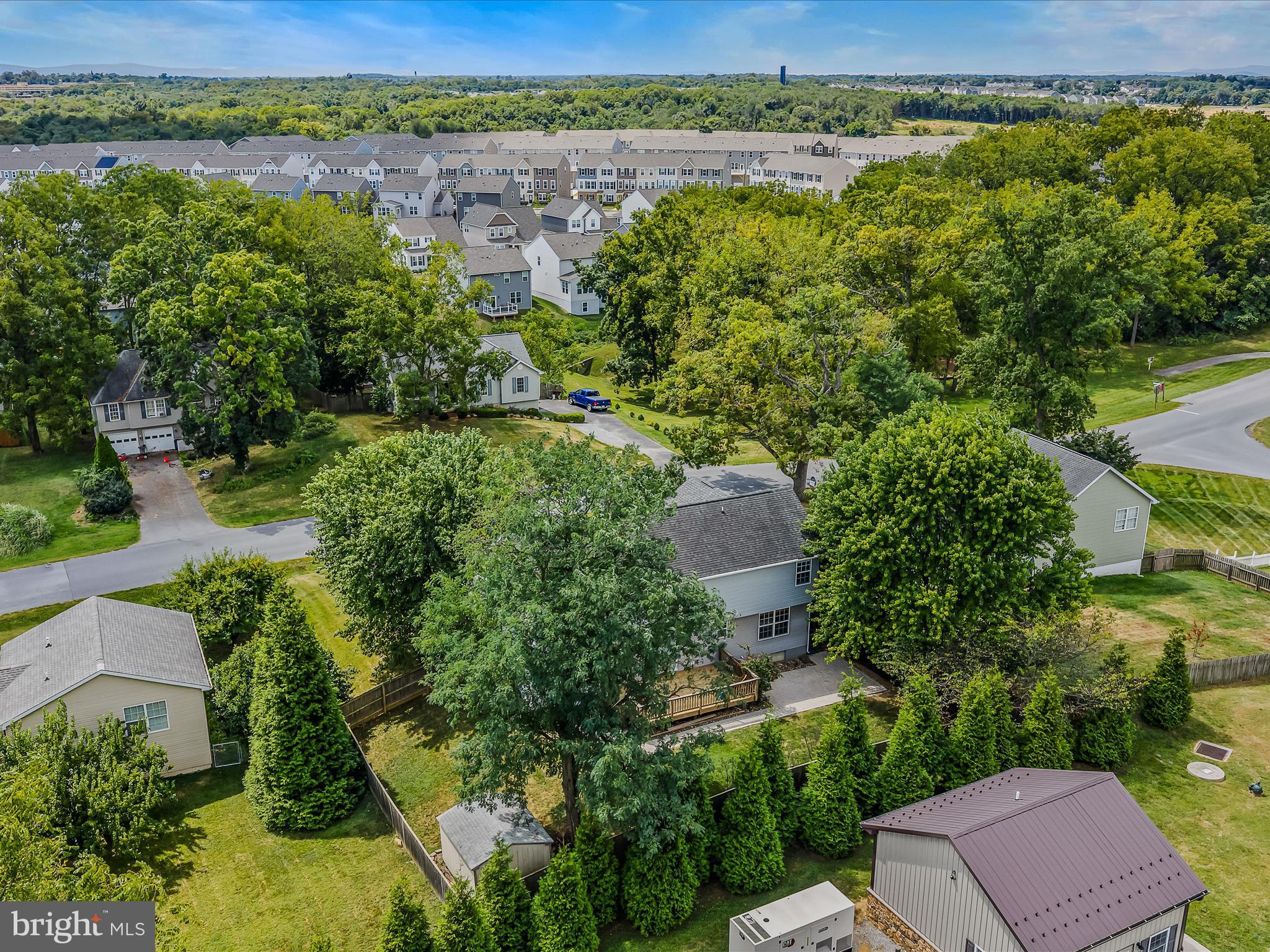 571 Oak Lee Drive Ranson, WV 25438 - Photo 36 of 45 an aerial view of a residential houses with outdoor space and trees
