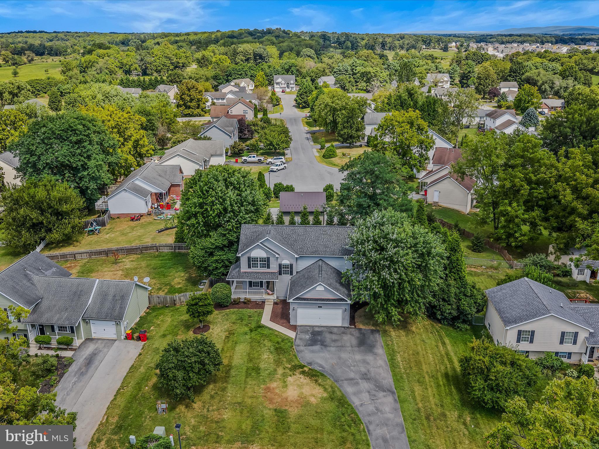 571 Oak Lee Drive Ranson, WV 25438 - Photo 38 of 45 an aerial view of residential houses with outdoor space and trees