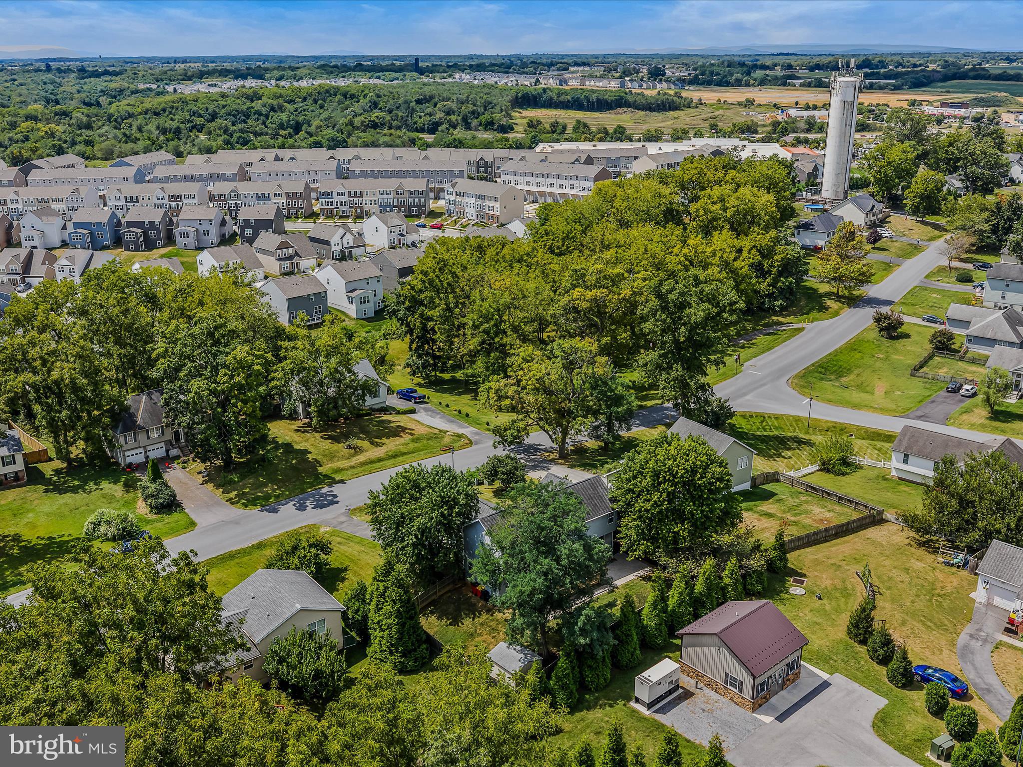 571 Oak Lee Drive Ranson, WV 25438 - Photo 43 of 45 an aerial view of residential houses with outdoor space and trees