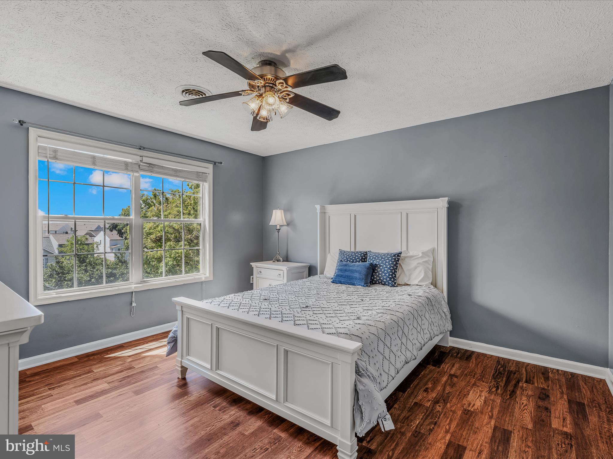 571 Oak Lee Drive Ranson, WV 25438 - Photo 10 of 45 a bedroom with a large bed and a window