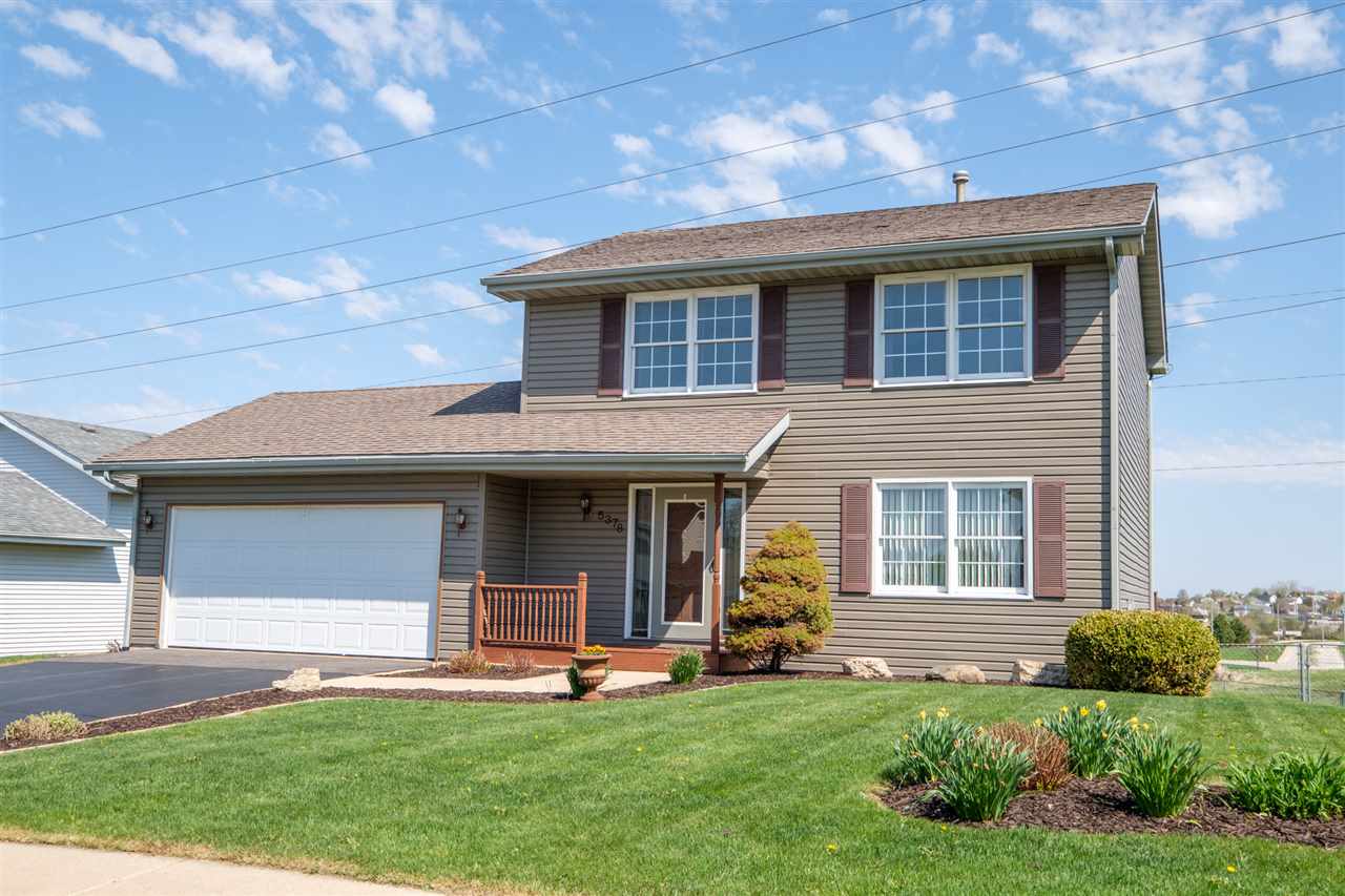 5378 Torque Road Loves Park, IL 61111 - Photo 1 of 24 a view of a house with a yard and a large tree