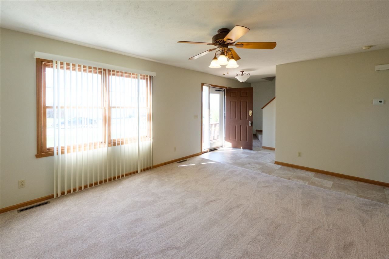 5378 Torque Road Loves Park, IL 61111 - Photo 5 of 24 a view of an empty room with a window