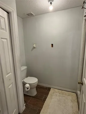 a bathroom with a toilet