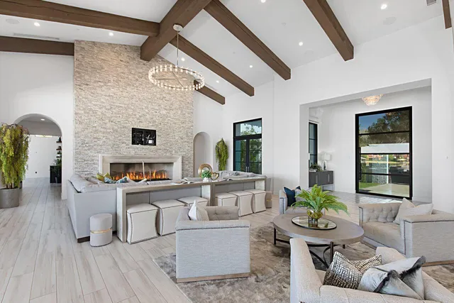 a living room with furniture and a rug