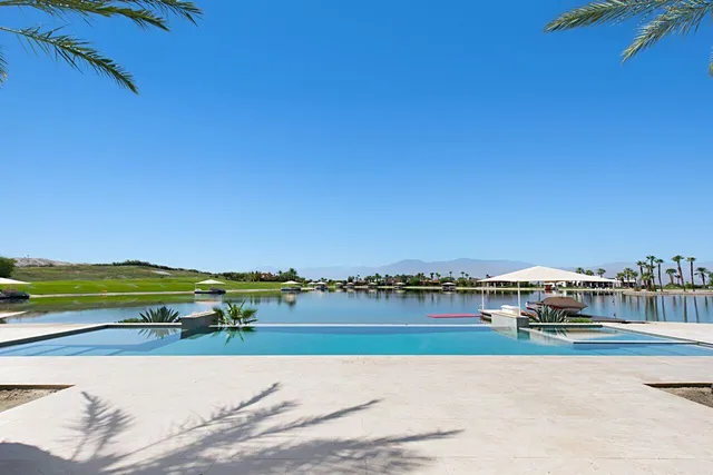 a kitchen with a dining table and chairs
