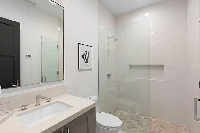 a room with a chair and shelf