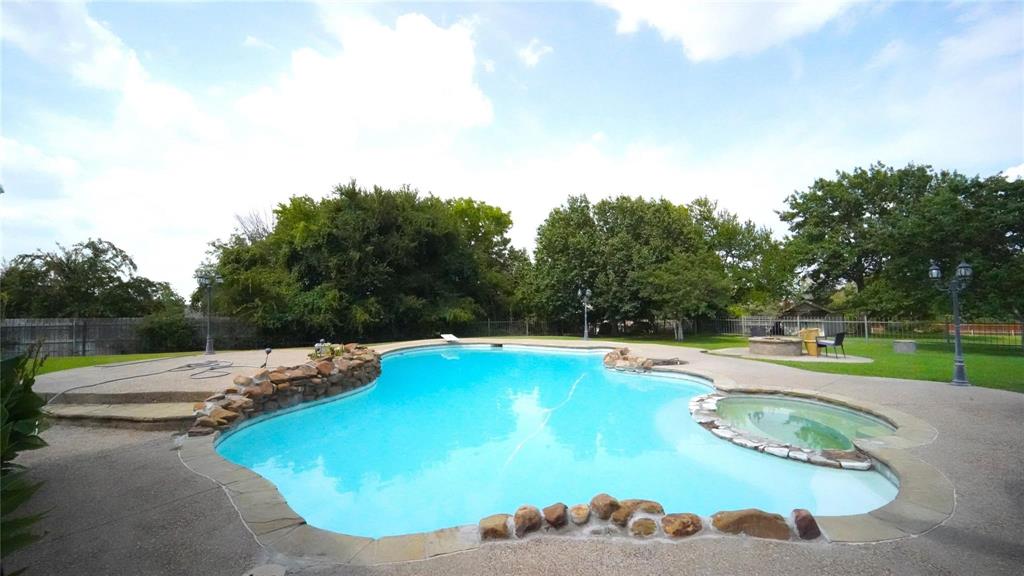 3718 Cliff View Loop Weatherford, TX 76087 - Photo 23 of 24 a view of a swimming pool with an outdoor space