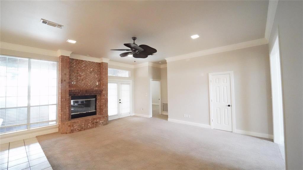 3718 Cliff View Loop Weatherford, TX 76087 - Photo 4 of 24 a view of a livingroom with a fireplace and window