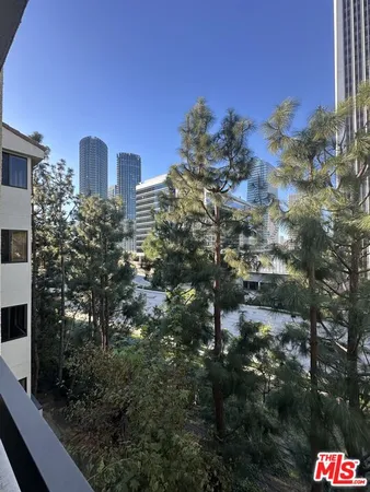 a city view with tall buildings