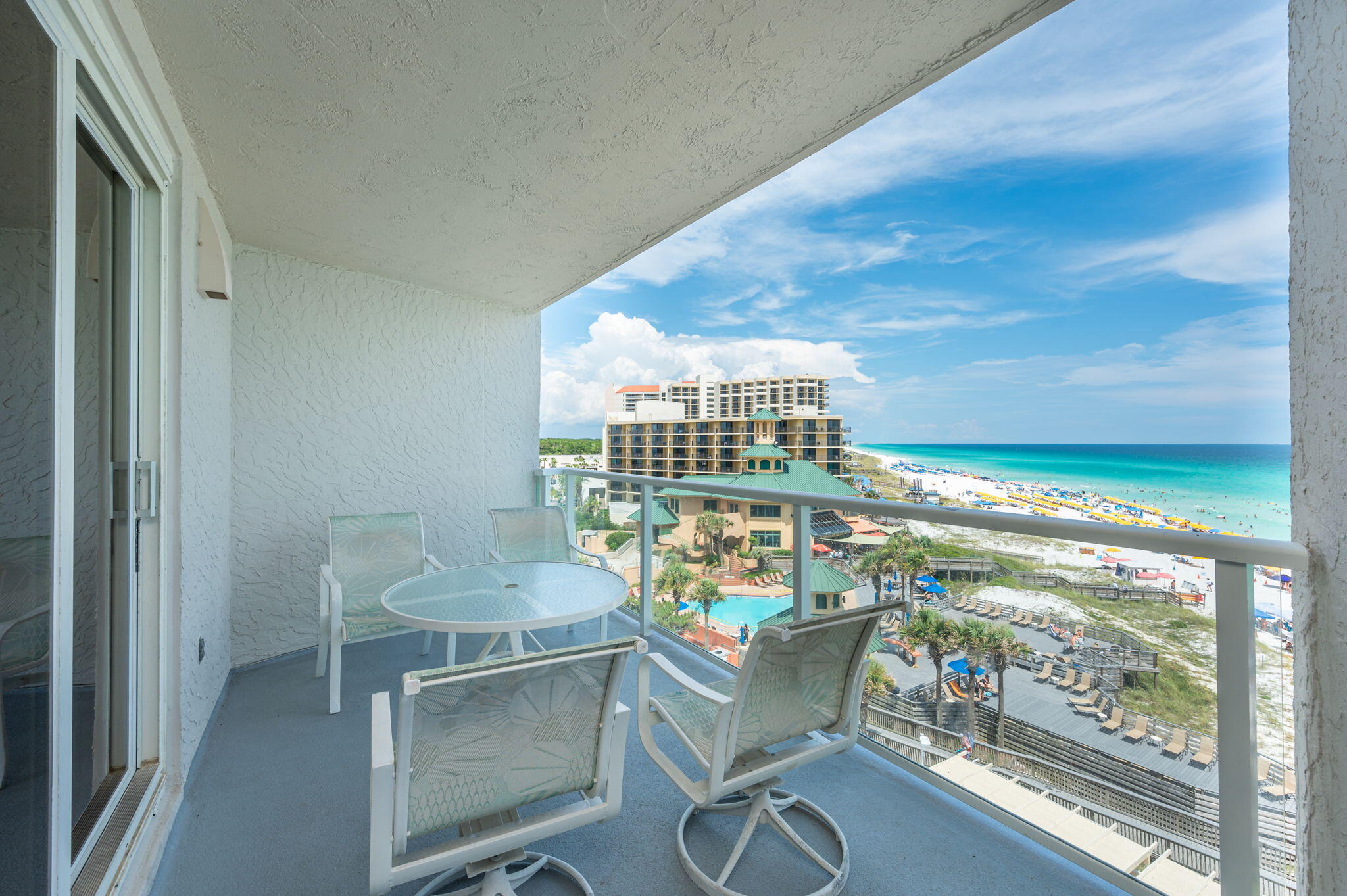 4277 Beachside 2, Unit 4277 Miramar Beach, FL 32550 - Photo 21 of 71 a balcony with table and chairs