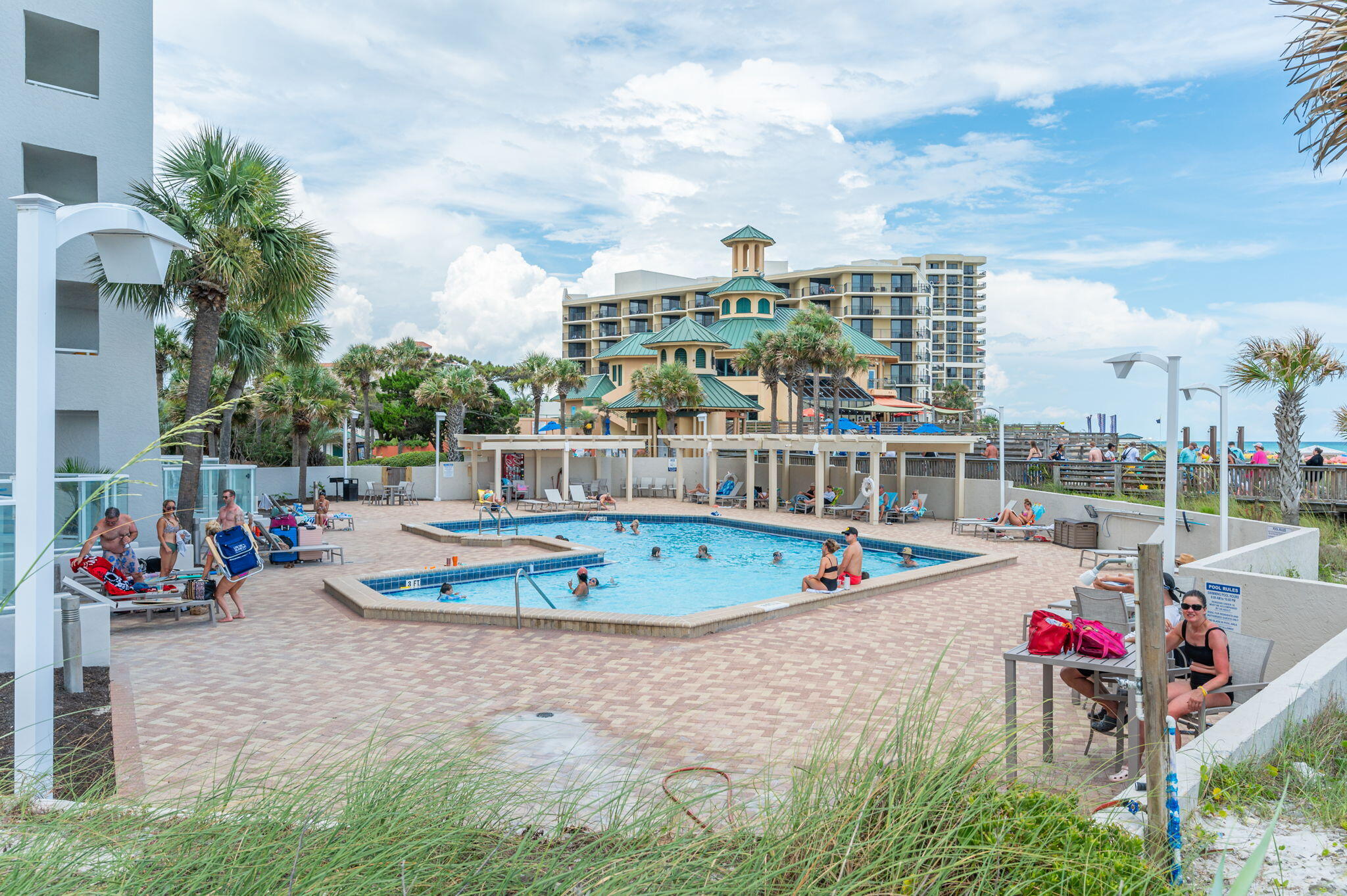 4277 Beachside 2, Unit 4277 Miramar Beach, FL 32550 - Photo 29 of 71 a view of a swimming pool with sitting area