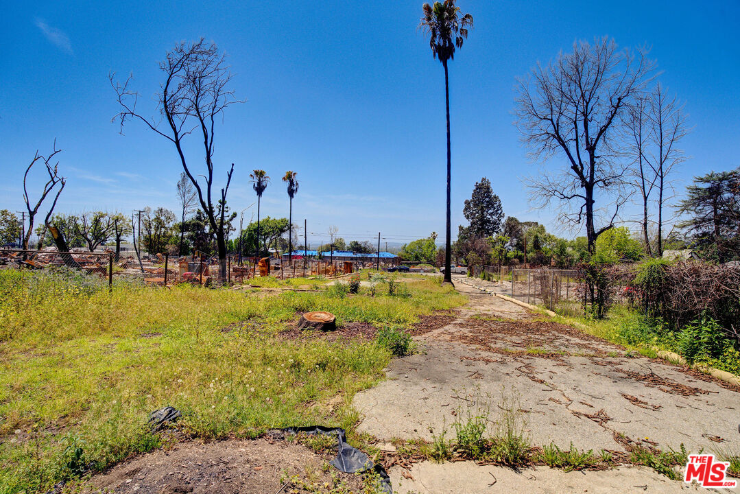 691 East Pine Street Altadena, CA 91001 - Photo 12 of 16 a view of a swimming pool with a patio