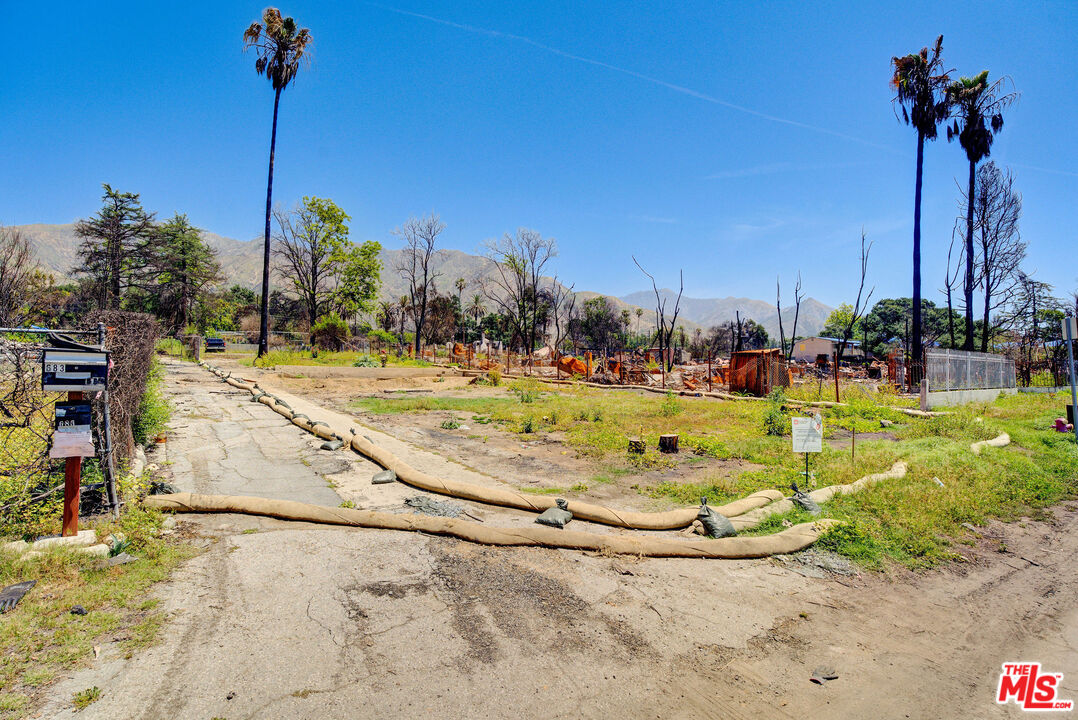 691 East Pine Street Altadena, CA 91001 - Photo 16 of 16 a view of a swimming pool with a yard