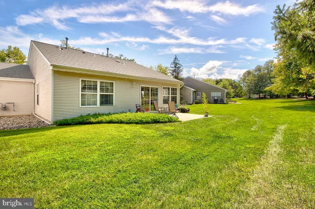 a view of a house with a big yard