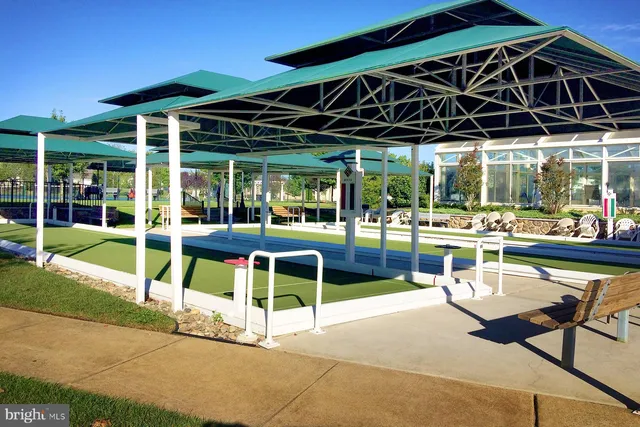 a view of a chairs and table in a patio