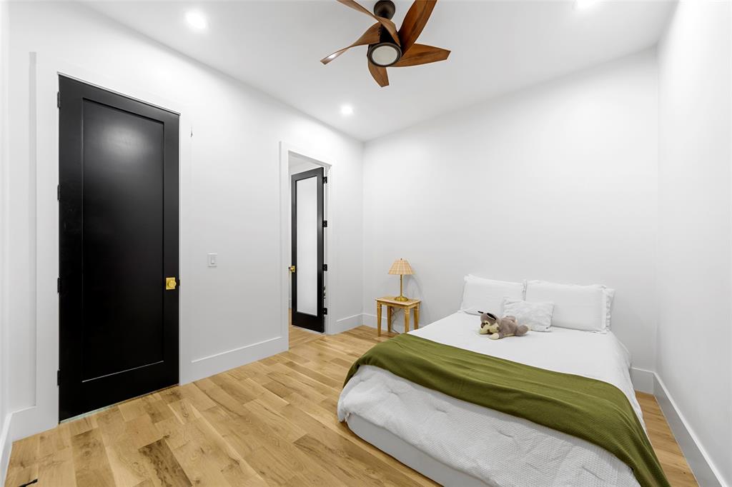 1088 Smith Oak Road Sherman, TX 75090 - Photo 20 of 39 a bedroom with a bed and a dresser