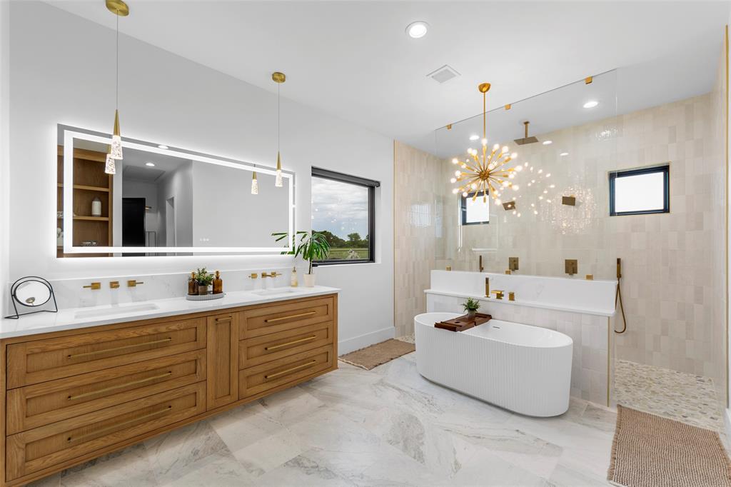 1088 Smith Oak Road Sherman, TX 75090 - Photo 26 of 39 a bathroom with a double vanity sink mirror and bathtub