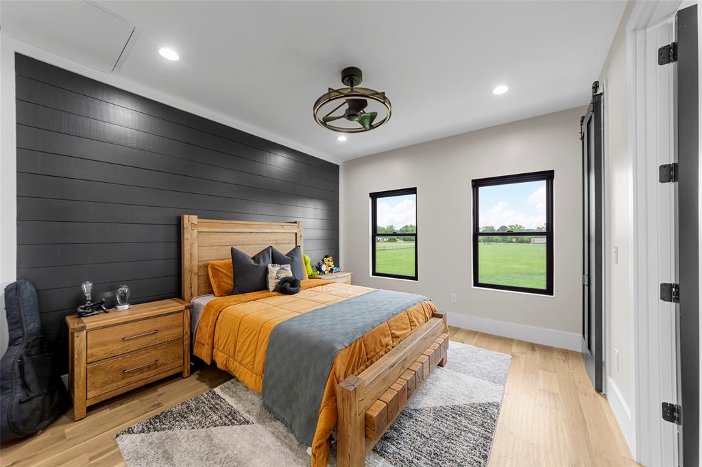 1088 Smith Oak Road Sherman, TX 75090 - Photo 27 of 39 a bedroom with a bed and a window