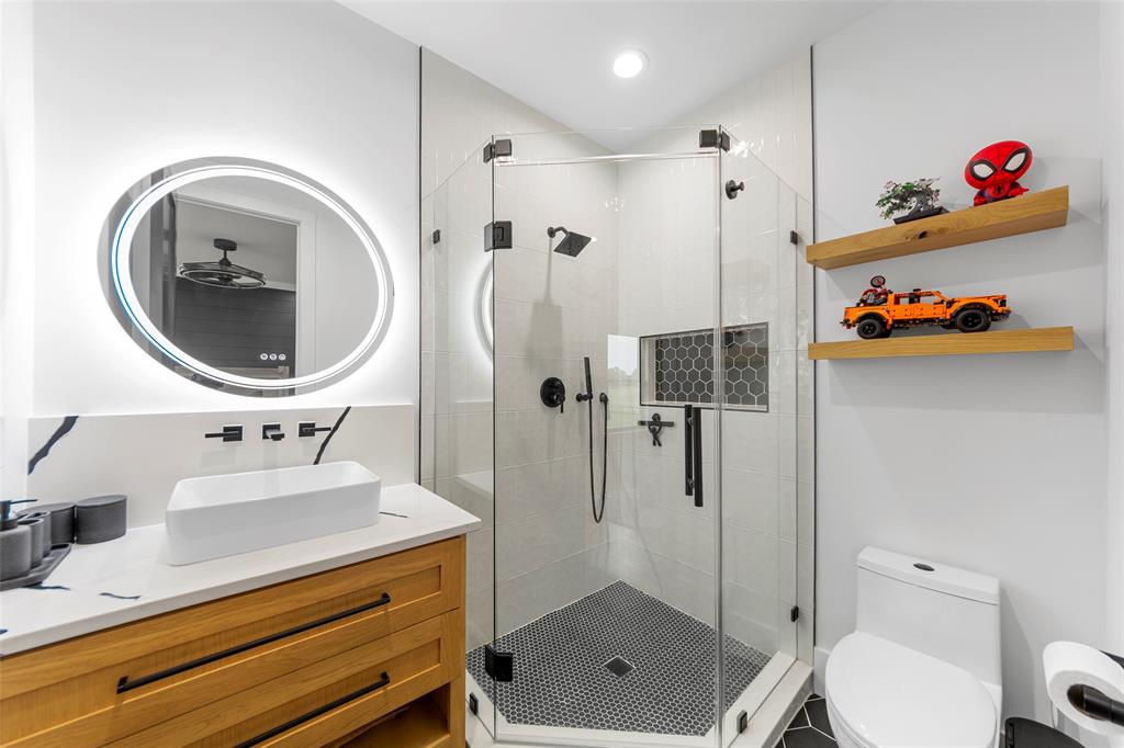 1088 Smith Oak Road Sherman, TX 75090 - Photo 30 of 39 a bathroom with a sink toilet and shower