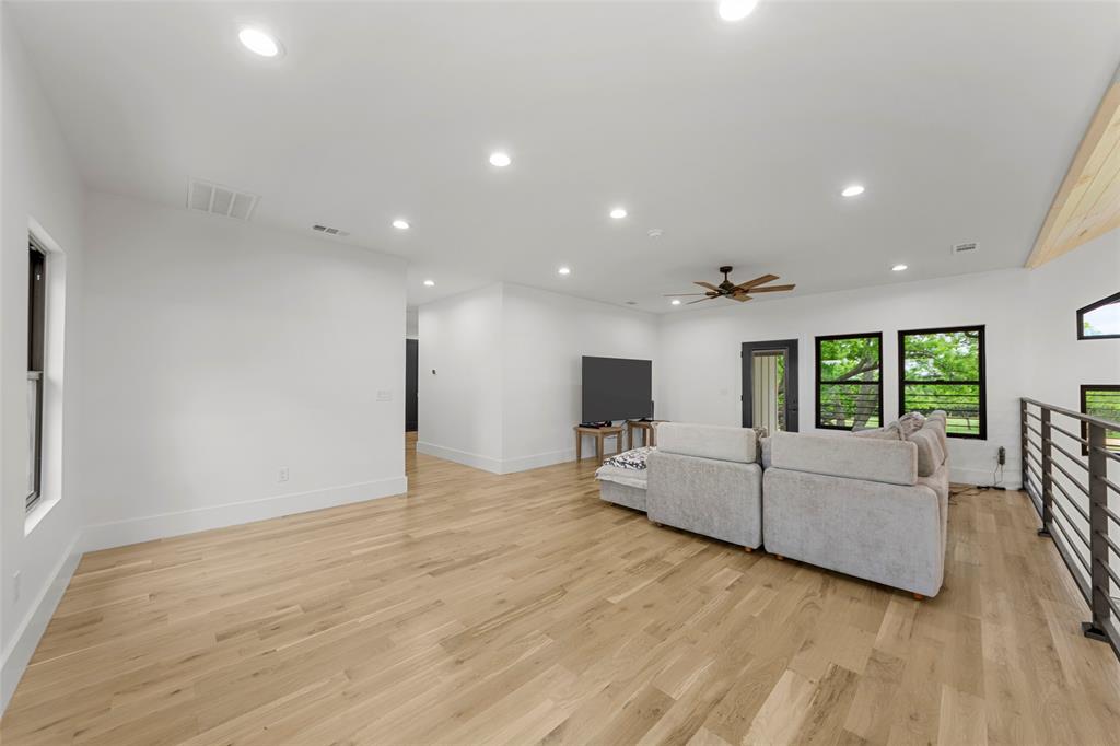 1088 Smith Oak Road Sherman, TX 75090 - Photo 31 of 39 a living room with furniture and a large window