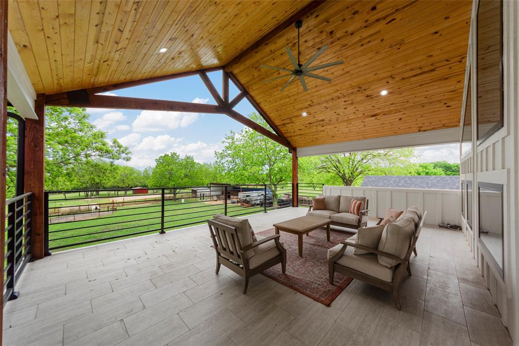 1088 Smith Oak Road Sherman, TX 75090 - Photo 4 of 39 a patio with yard glass top table and chairs