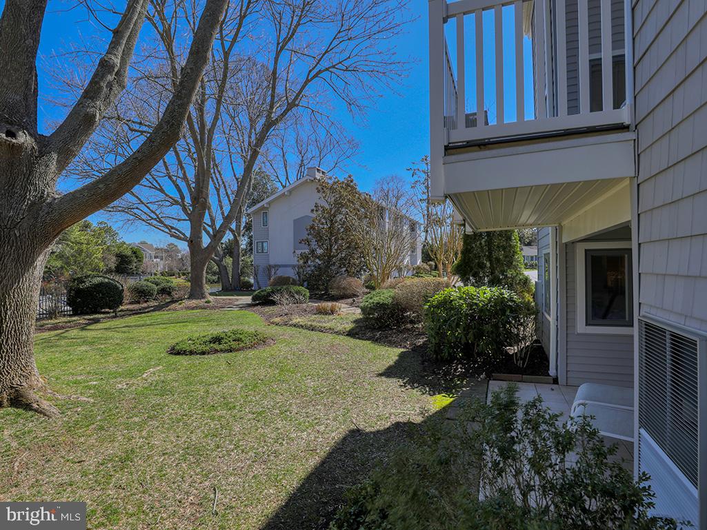 11 Newbold Square, Unit 11 Rehoboth Beach, DE 19971 - Photo 20 of 21 a view of a house with a yard
