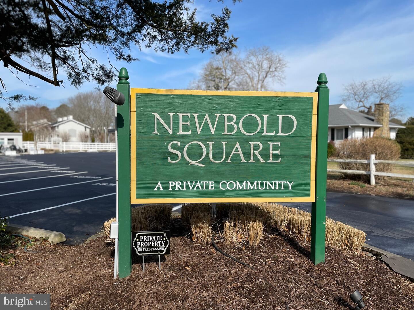 11 Newbold Square, Unit 11 Rehoboth Beach, DE 19971 - Photo 21 of 21 a sign on the side of the road