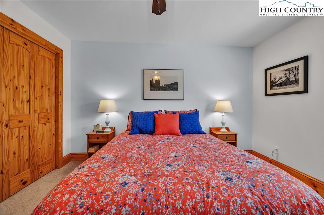 1118 Lucy Bell Road Crumpler, NC 28617 - Photo 28 of 39 a bedroom with bed and window