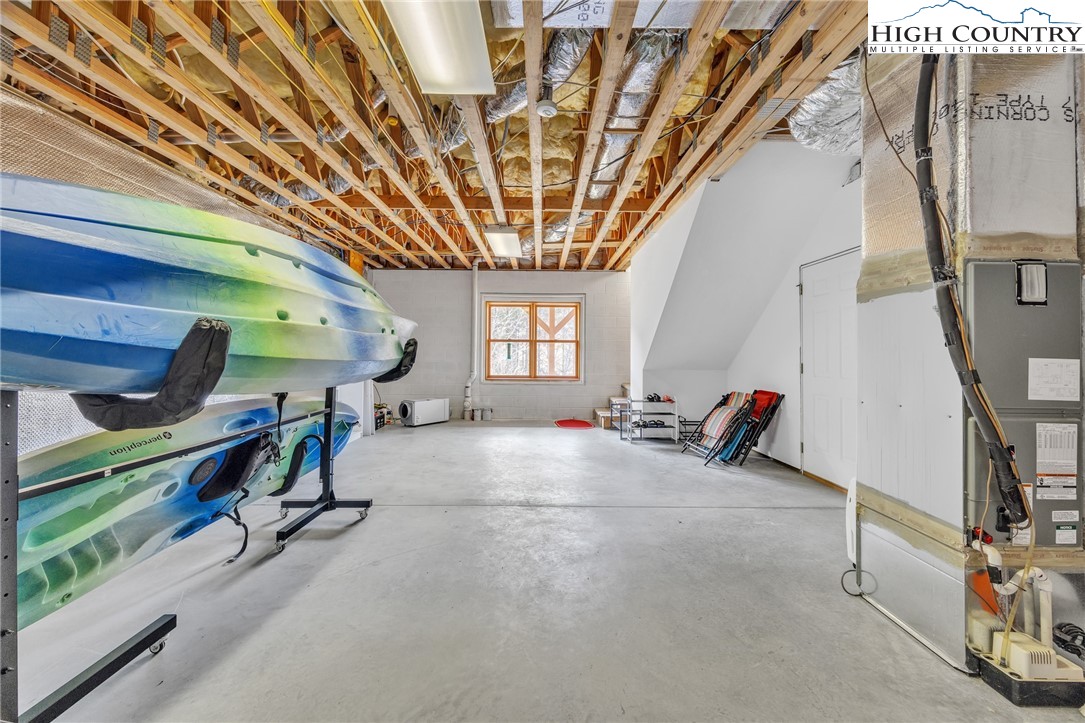 1118 Lucy Bell Road Crumpler, NC 28617 - Photo 30 of 39 a view of a room with gym equipment