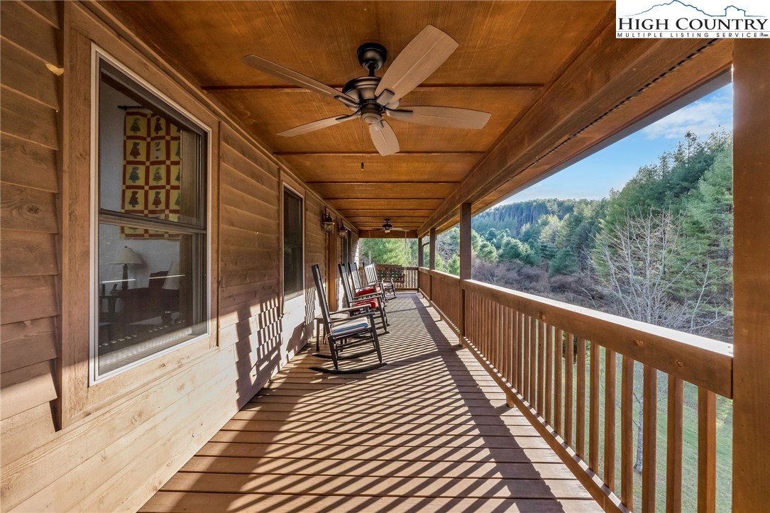 1118 Lucy Bell Road Crumpler, NC 28617 - Photo 3 of 39 a view of a balcony with couch