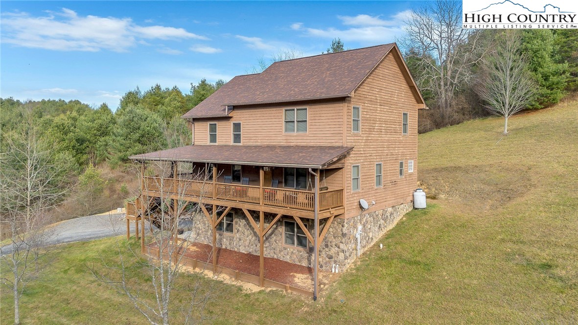 1118 Lucy Bell Road Crumpler, NC 28617 - Photo 35 of 39 a house view with a garden space