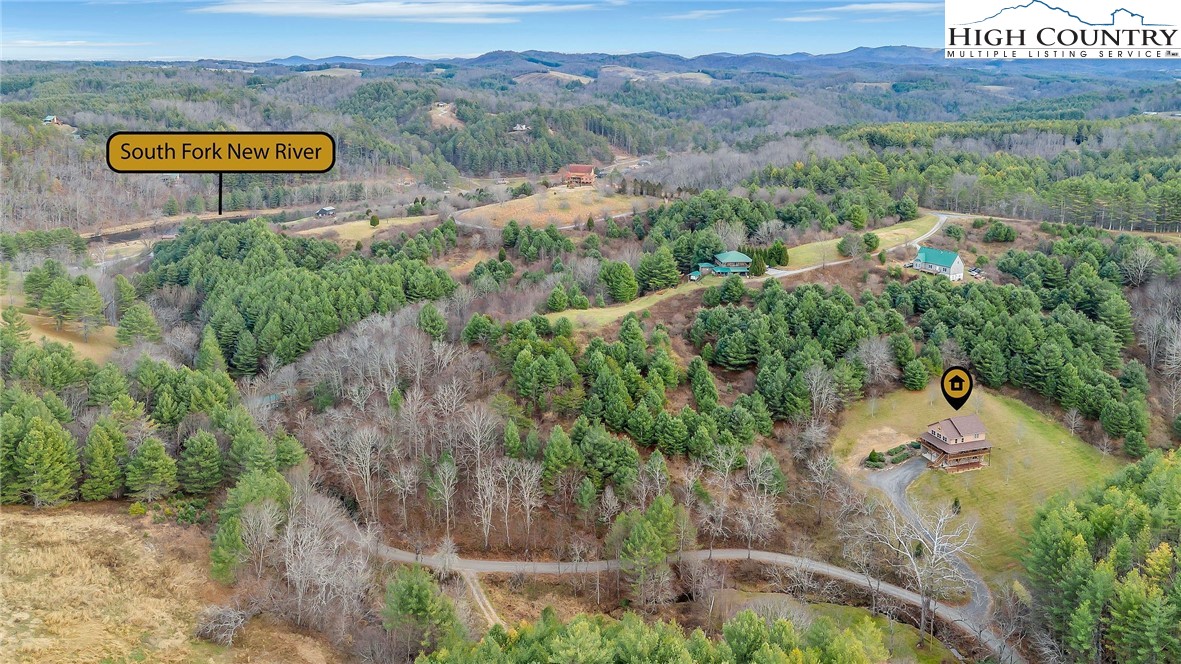 1118 Lucy Bell Road Crumpler, NC 28617 - Photo 38 of 39 a view of a street with a sign of it