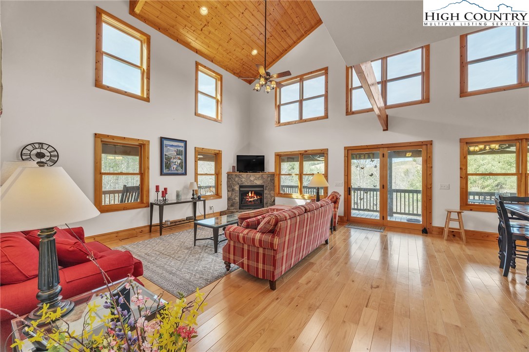 1118 Lucy Bell Road Crumpler, NC 28617 - Photo 5 of 39 a living room with furniture and wooden floor