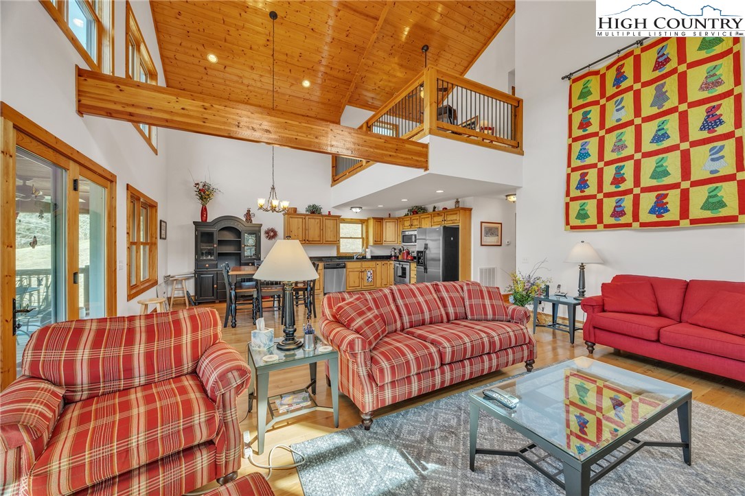 1118 Lucy Bell Road Crumpler, NC 28617 - Photo 6 of 39 a living room with furniture and a large window