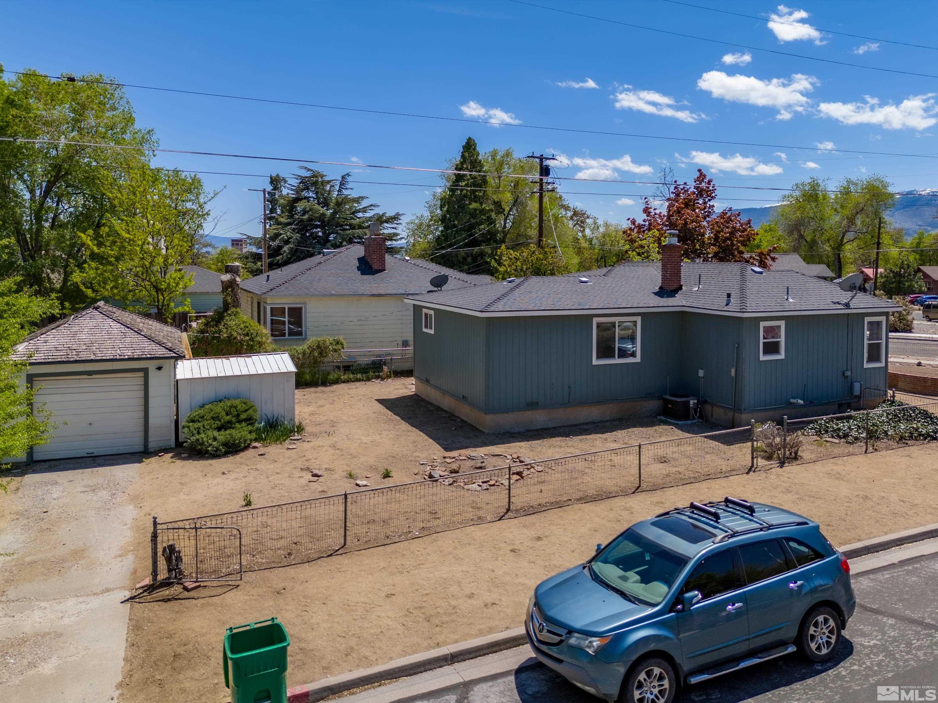 1180 Codel Way Reno, NV 89503 - Photo 31 of 39 a car parked in front of a house