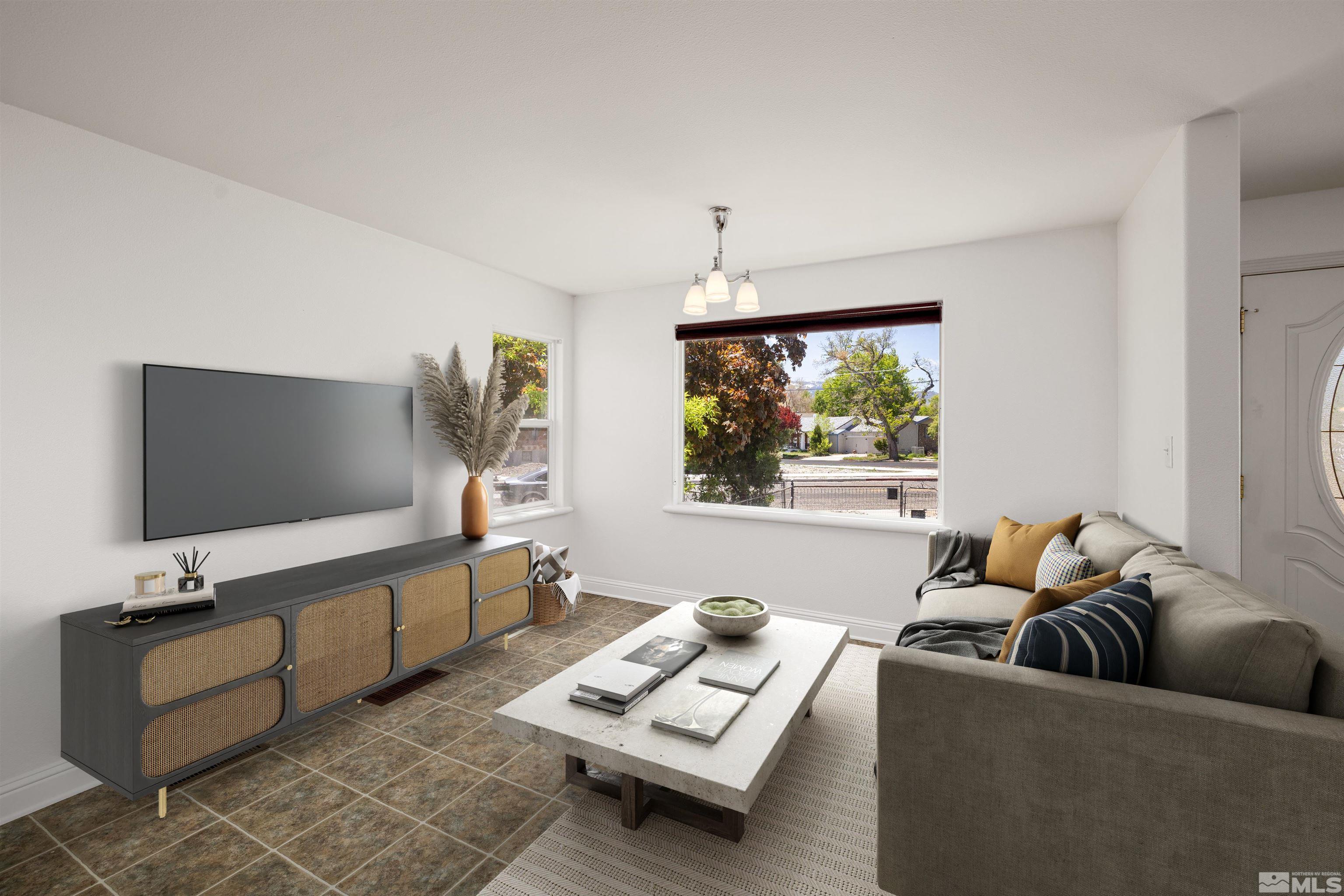 1180 Codel Way Reno, NV 89503 - Photo 8 of 39 a living room with furniture and a flat screen tv