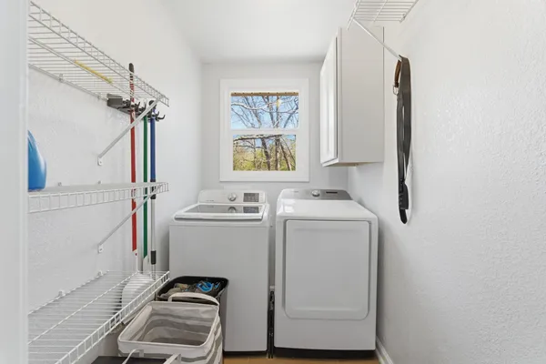 a bathroom with a sink toilet and a mirror