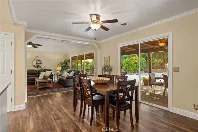 a large kitchen with stainless steel appliances granite countertop a sink stove and cabinets