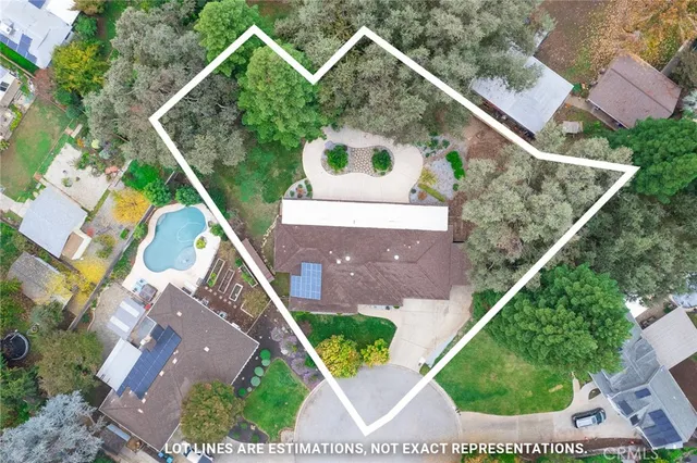 a view of a patio with table and chairs and potted plants